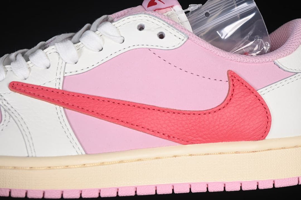 Close-up of the pink side panel and red Swoosh.