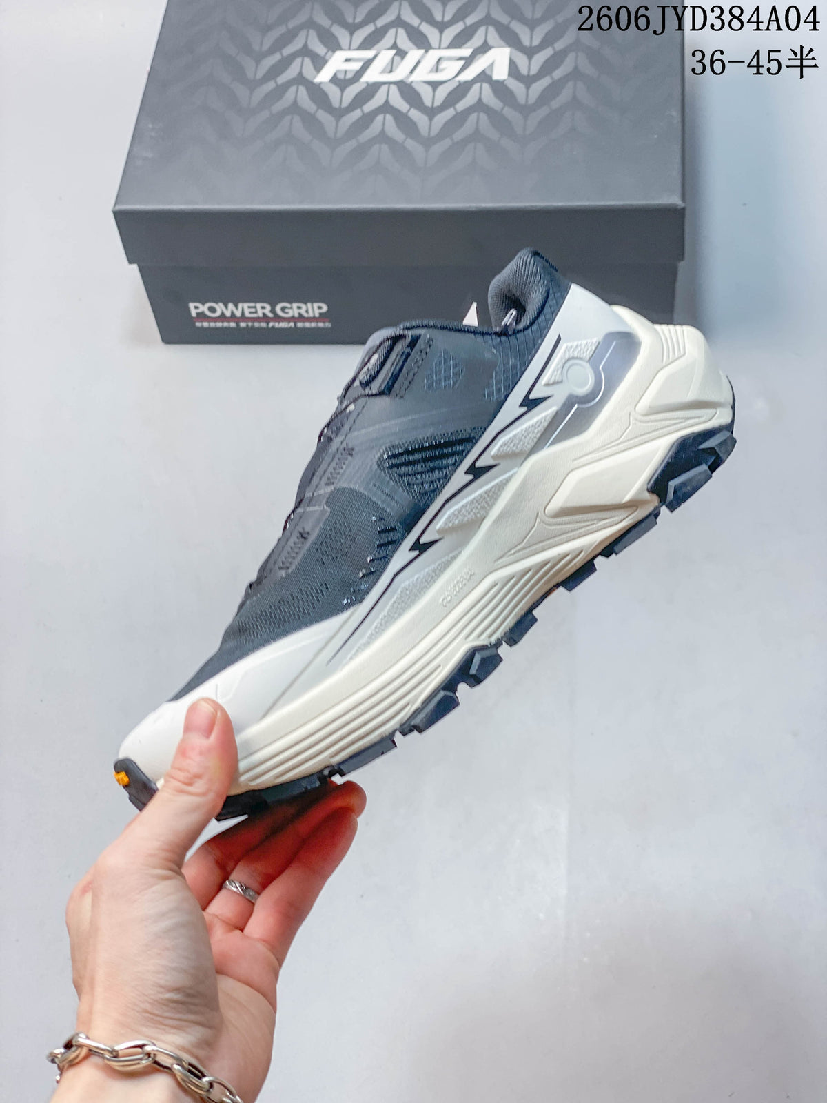 Side profile of the gray hiking shoe with a light-colored midsole
