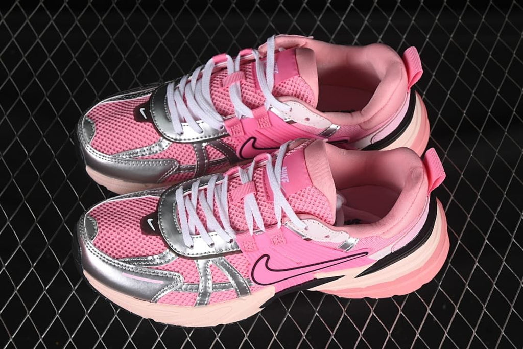 Pair of pink and silver-look Nike V2K Run sneakers viewed from above