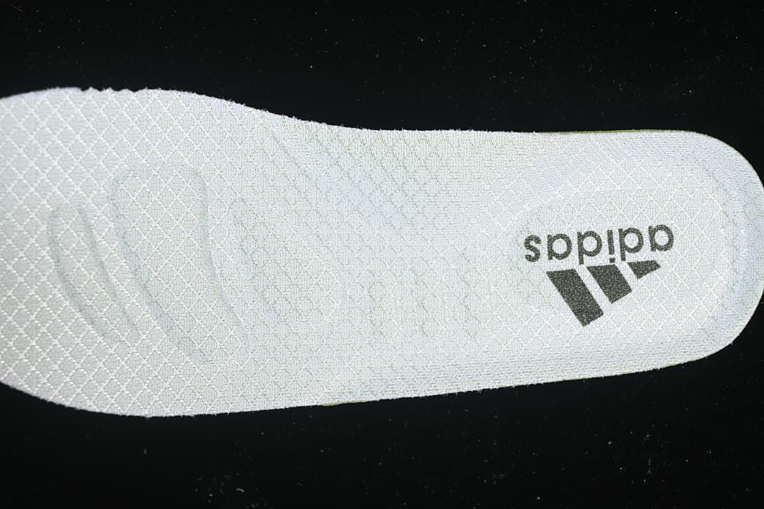 Close-up of the white Adidas-branded insole.