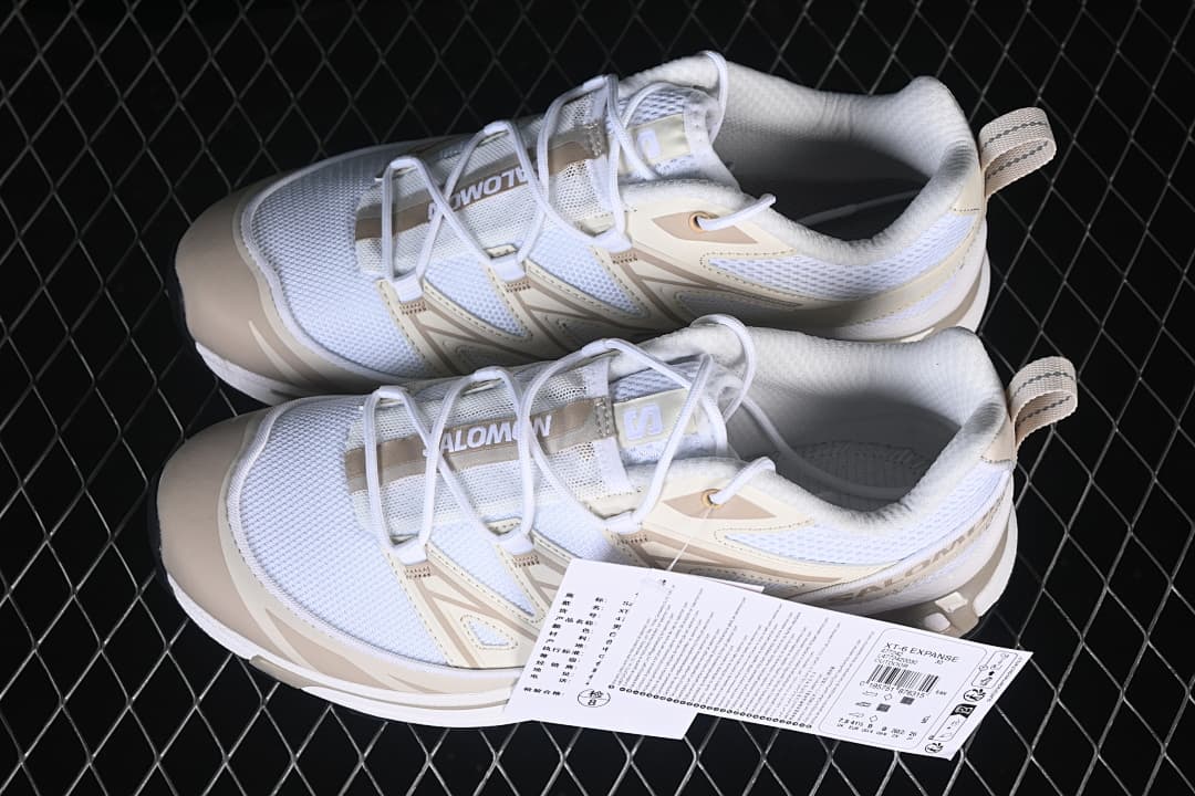 Pair of white and tan Salomon XT-6 Expanse sneakers shown from above.