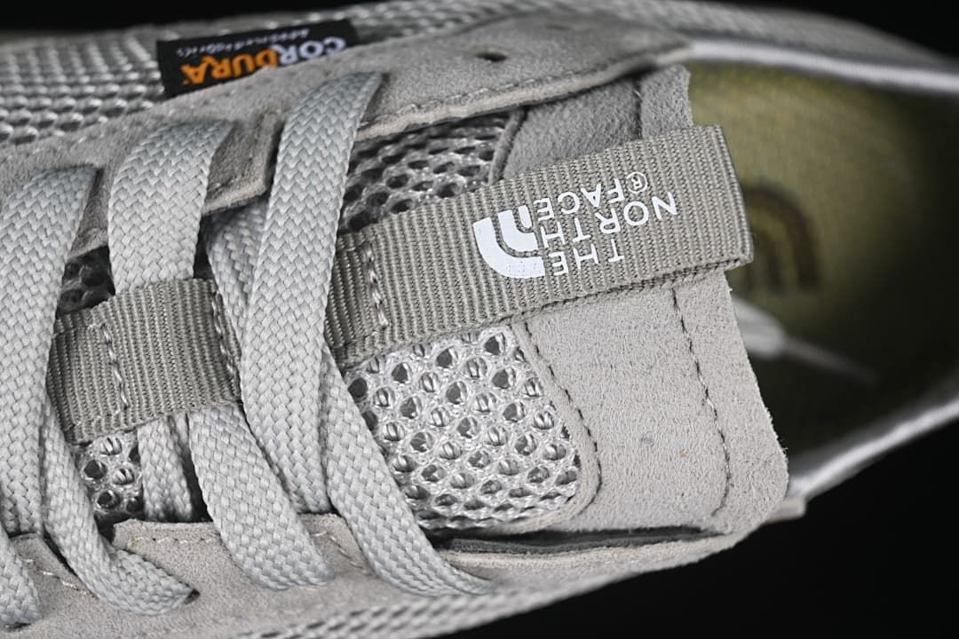 Close-up of the laces and branded tongue tab.