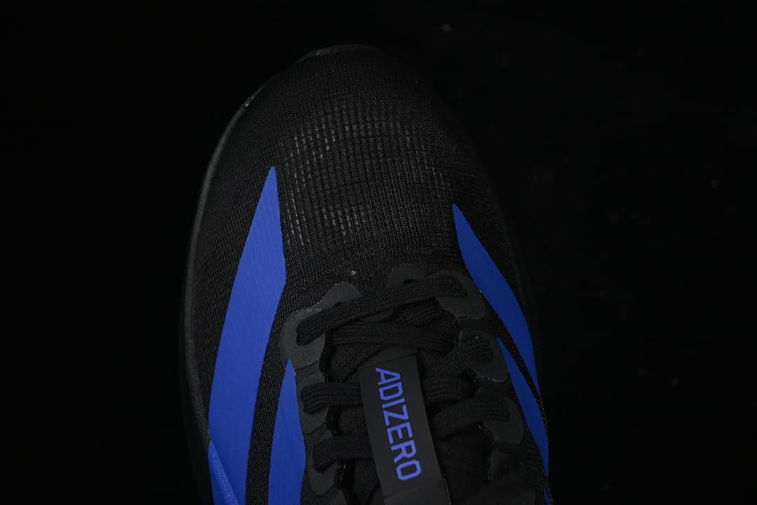 Top view of the black mesh toe and blue side stripes.