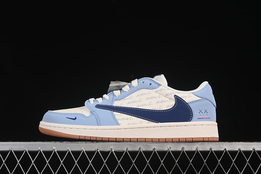 Side view of a light blue, navy, and off-white low-top sneaker with patterned panels and a gum-colored outsole