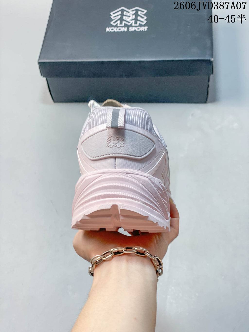 Rear view of a Kolon Sport sneaker showing the heel and outsole