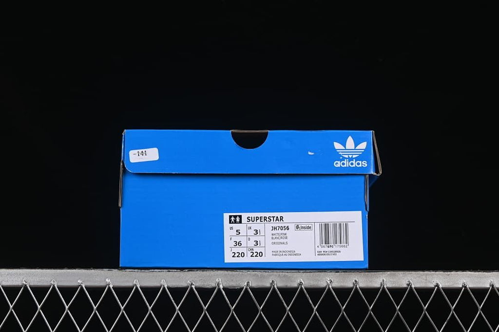 Blue shoe box label identifying Superstar JH7056 and showing US 5 and EU 36.