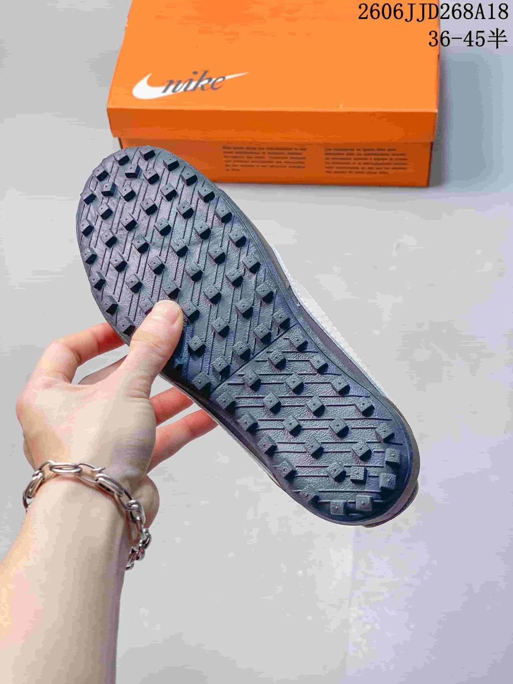 Close-up of the sneaker's lugged outsole.