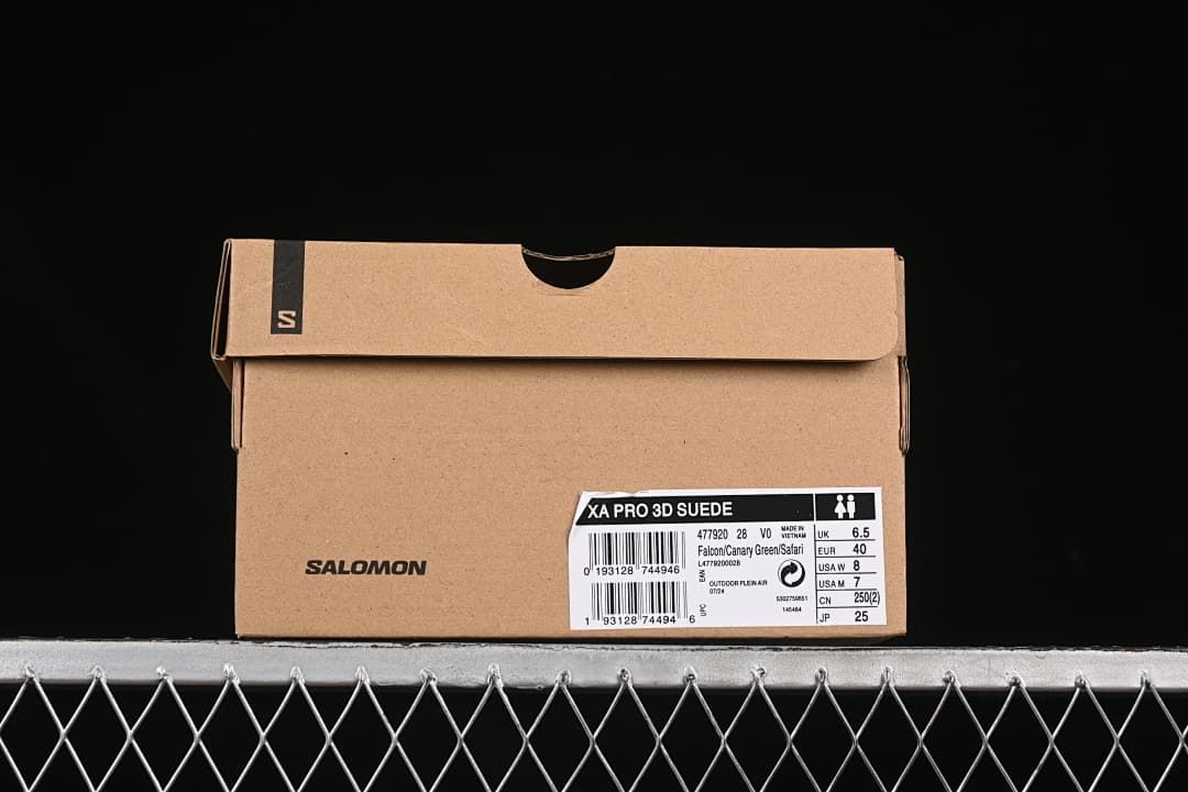 Shoe box label identifying XA Pro 3D Suede, Falcon/Canary Green/Safari, and sample sizes