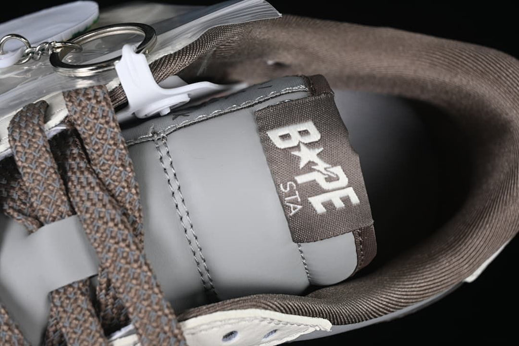 Close-up of the tongue, laces, and brown collar lining.