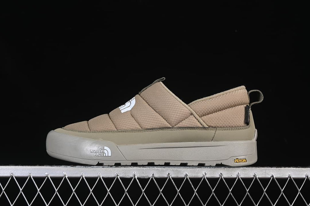 Side view of khaki The North Face Mountain Essentials slip-on shoes