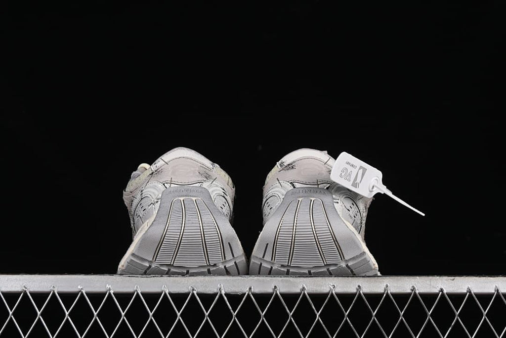 Rear view of the sneakers showing the heel and outsole
