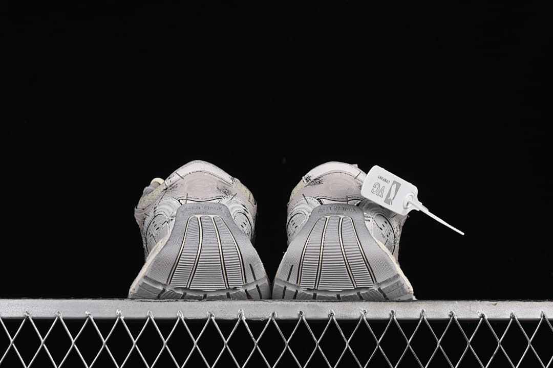 Rear view of the sneakers showing the heel and outsole