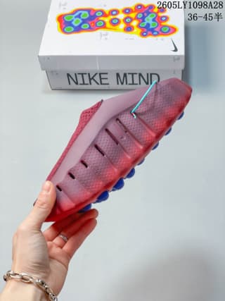 Side and sole detail of the red Nike Mind 001 mule.