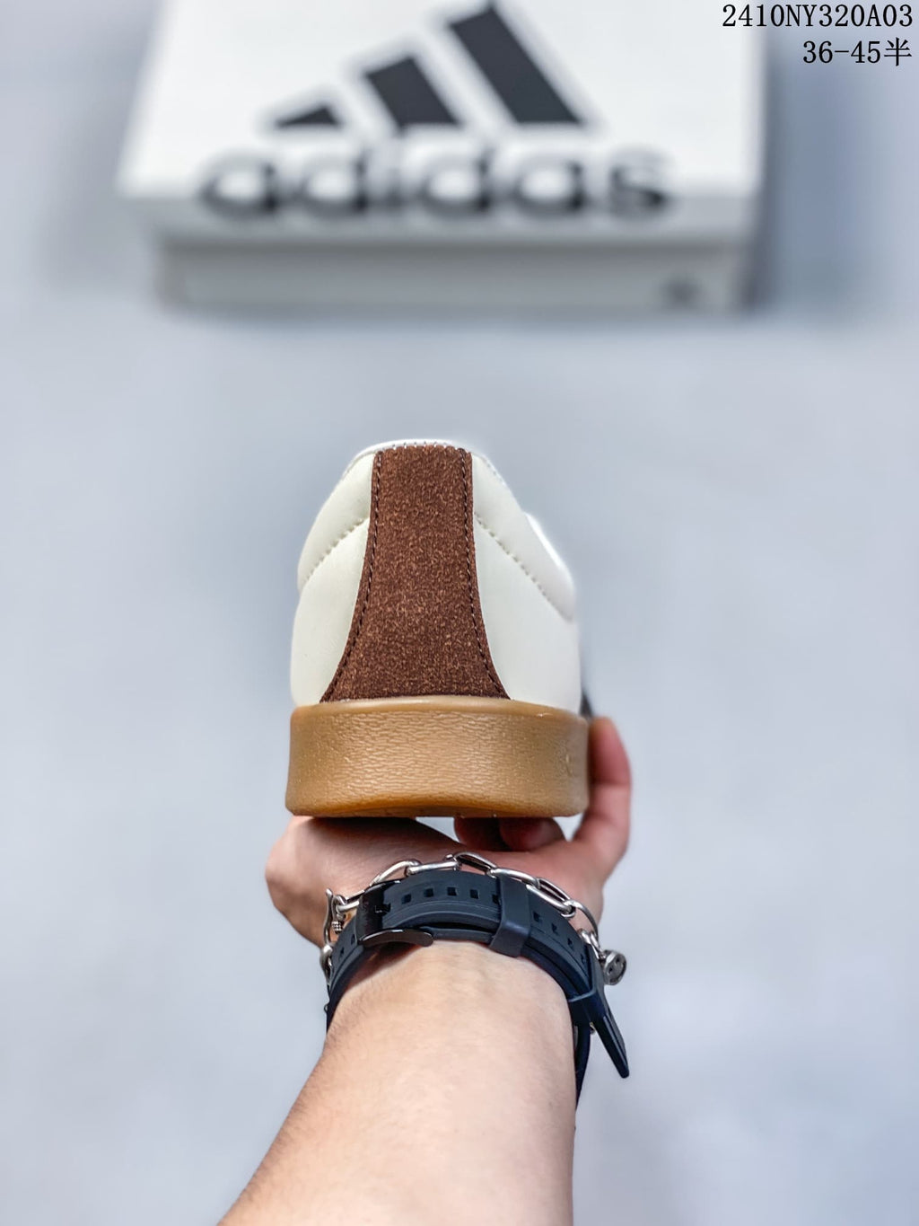 Rear view showing the brown heel accent and gum-colored sole