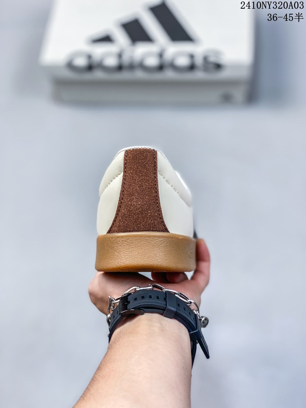 Rear view showing the brown heel accent and gum-colored sole