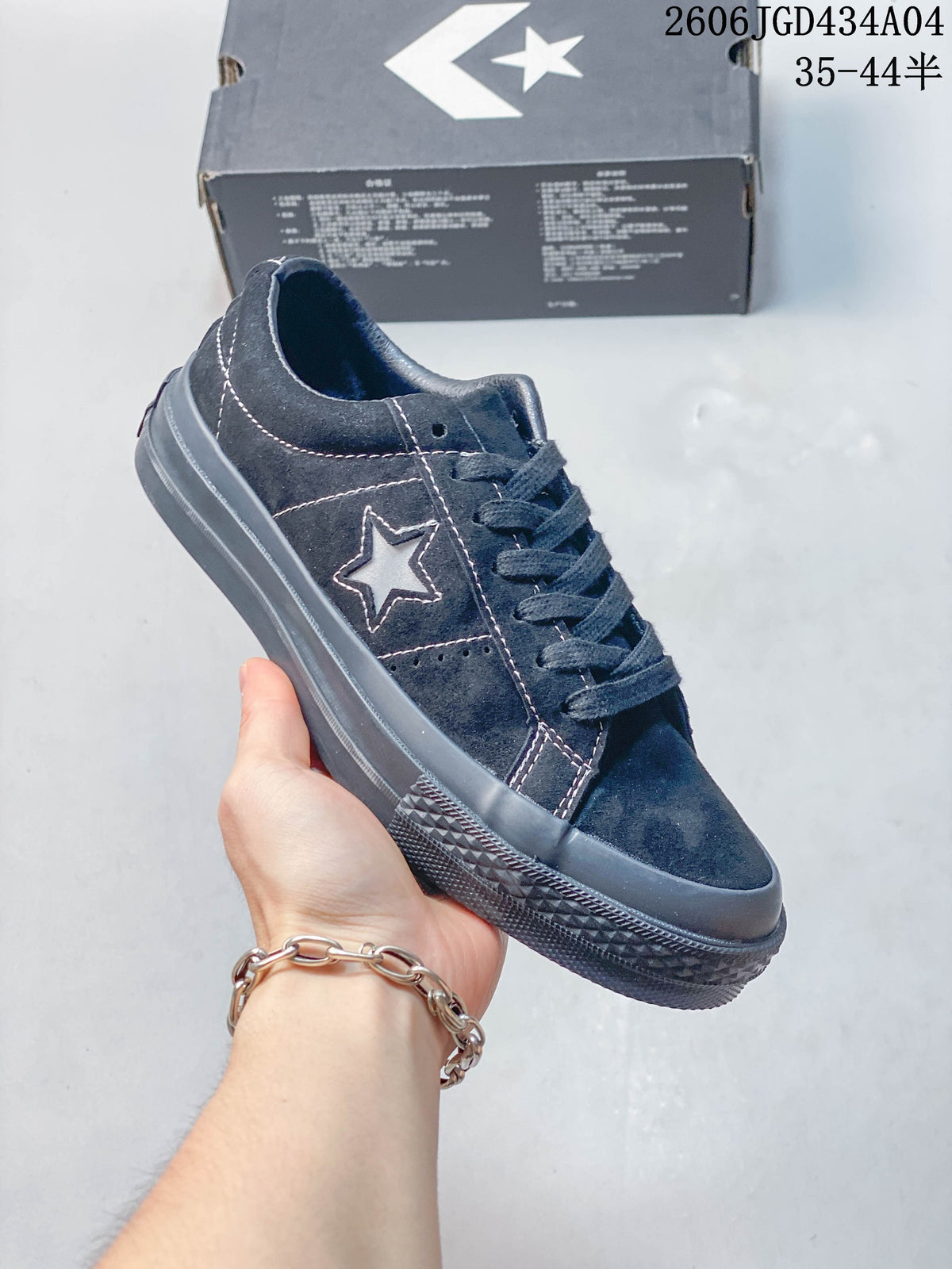 Angled side view of the dark blue Converse One Star Pro sneaker.