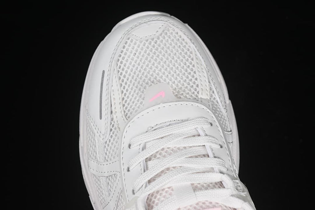 Top-down close-up of the mesh-look toe and white laces