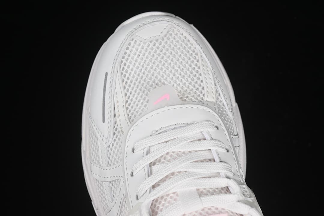 Top-down close-up of the mesh-look toe and white laces