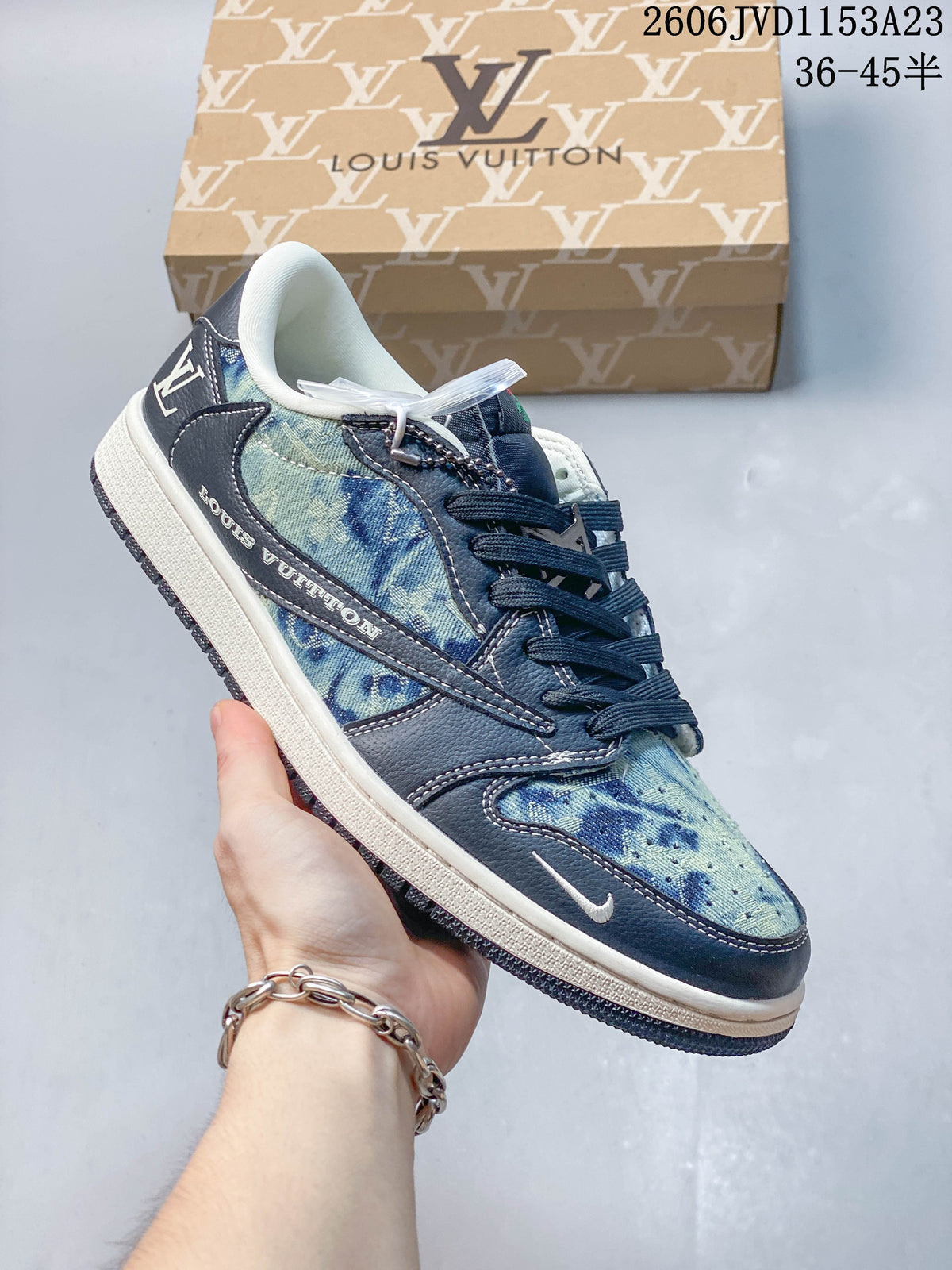 Angled side view showing the blue patterned panels and dark navy overlays