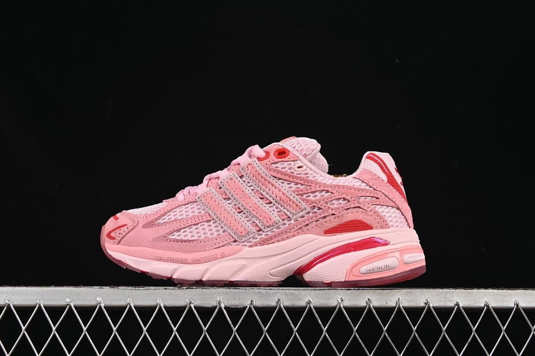 Side view of the pink adidas Adistar Cushion 3 sneaker.