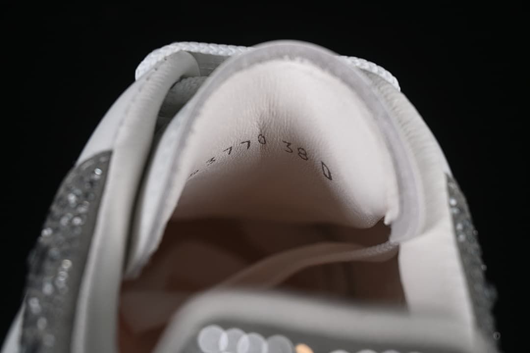 Close-up of the padded shoe tongue with a visible size marking of 38.
