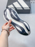 Underside of the white adidas Hyperboost sneaker showing its patterned gray and dark outsole.