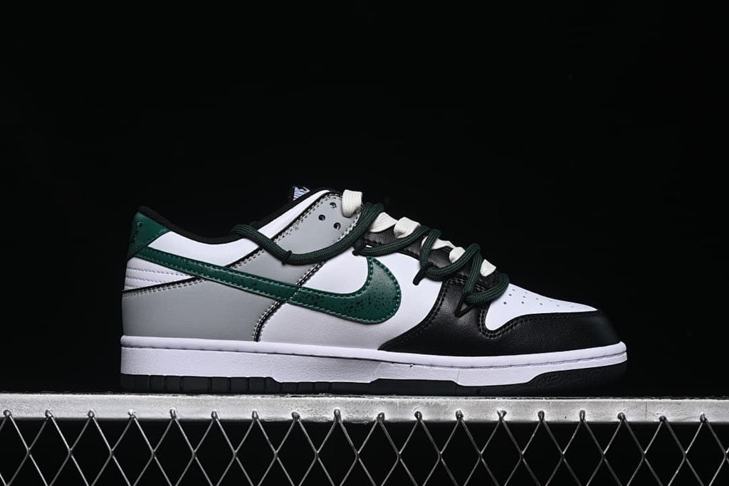 Side profile showing the low-top silhouette and green overlays