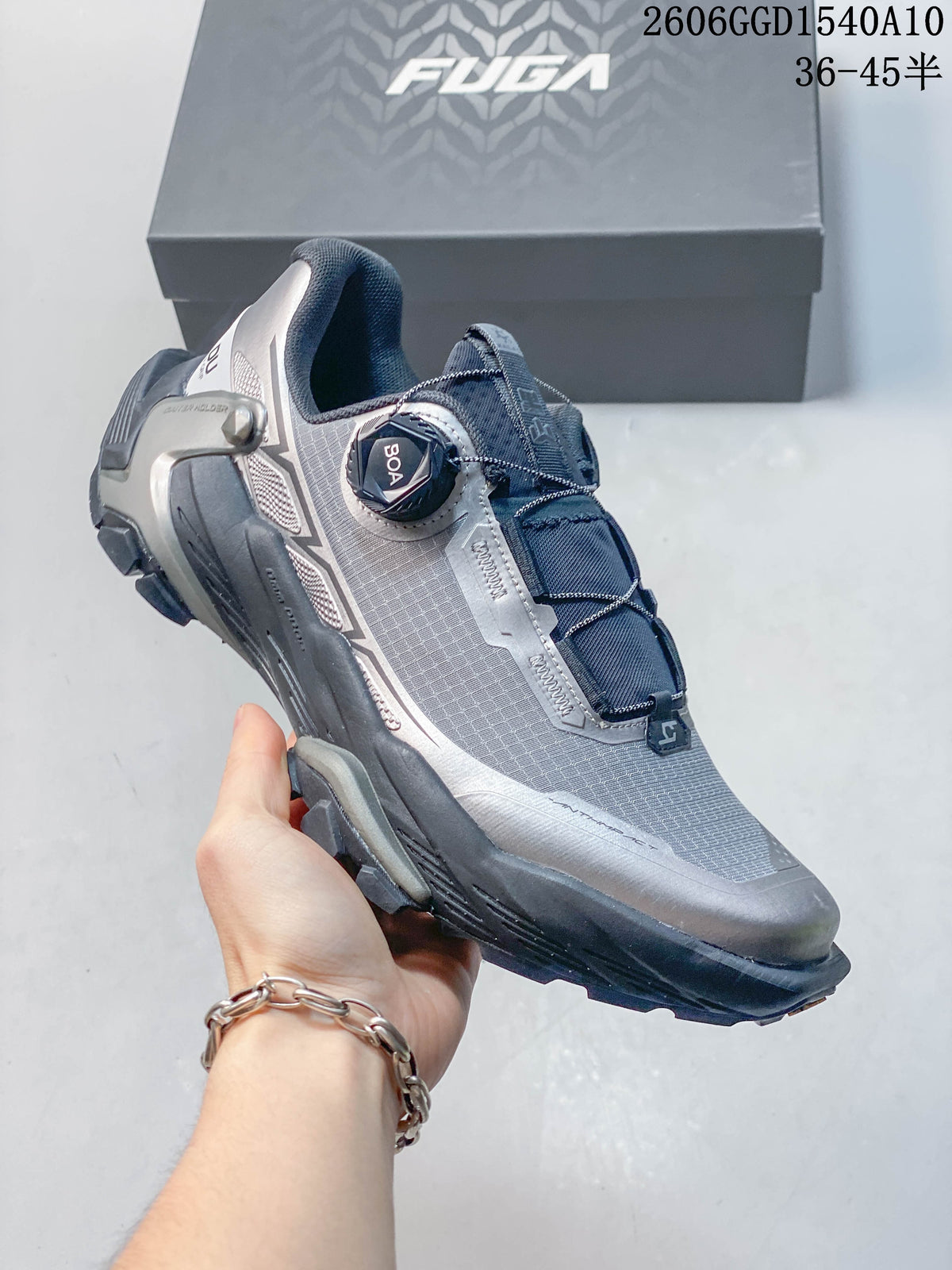 Angled side view of a gray KAILAS FUGA DU2 BOA trail shoe with its dial closure visible.