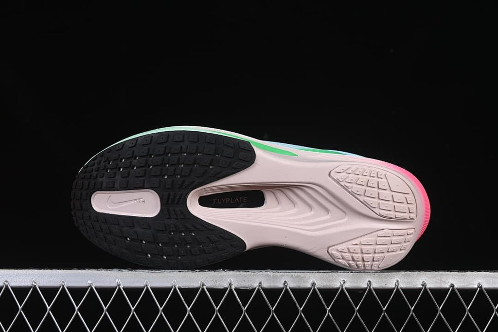 Underside view showing the black and pale outsole sections and central plate area.