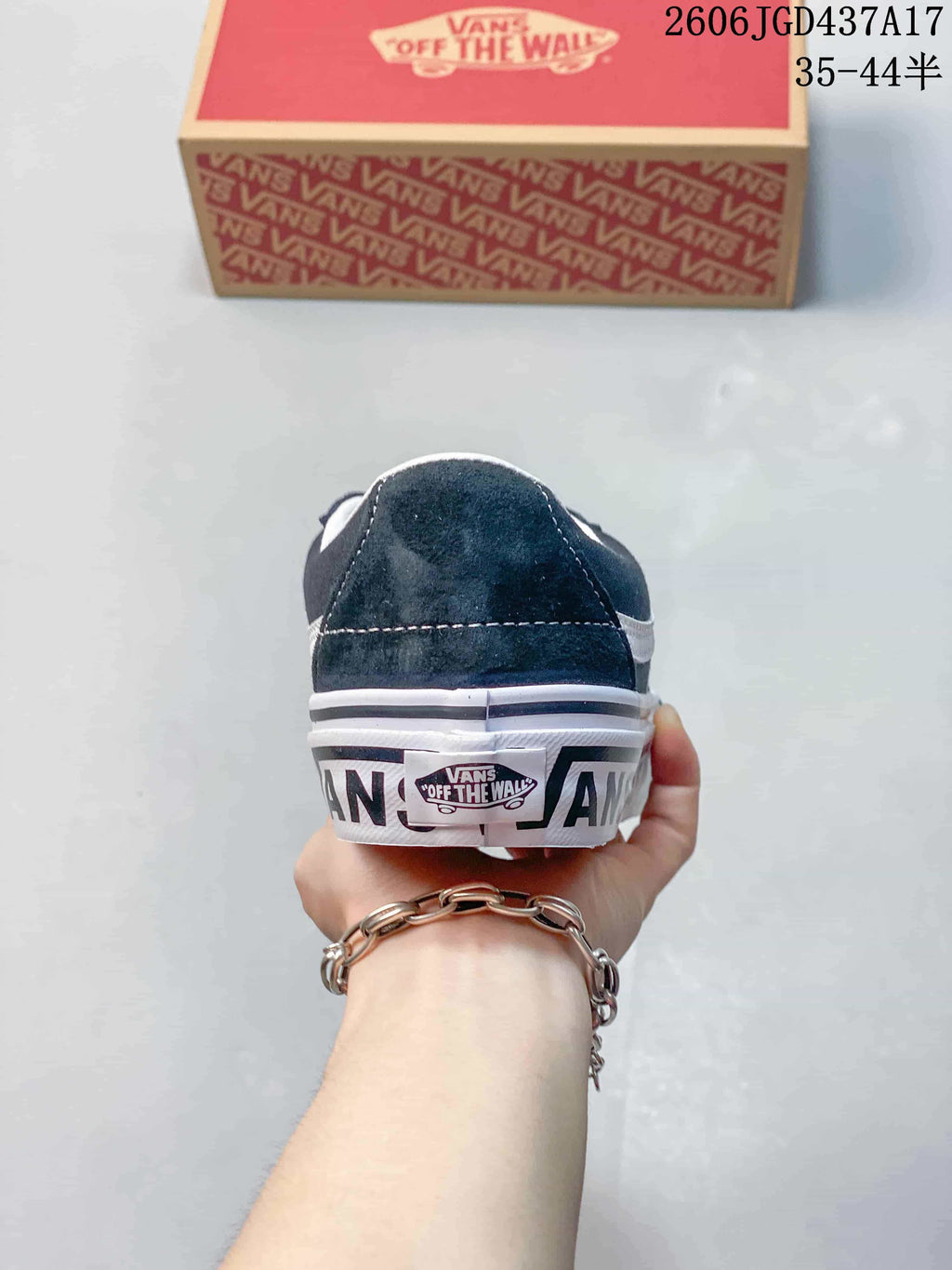 Rear view of the sneaker with Vans branding on the heel and sole