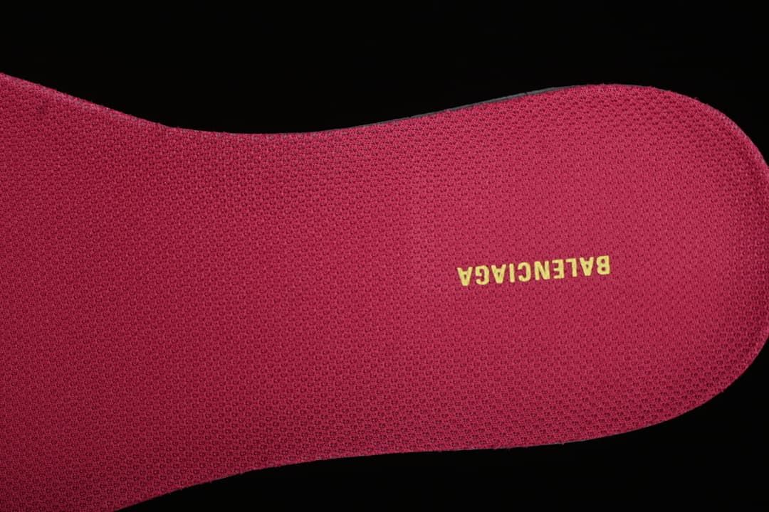 Close-up of the pink insole with yellow Balenciaga lettering