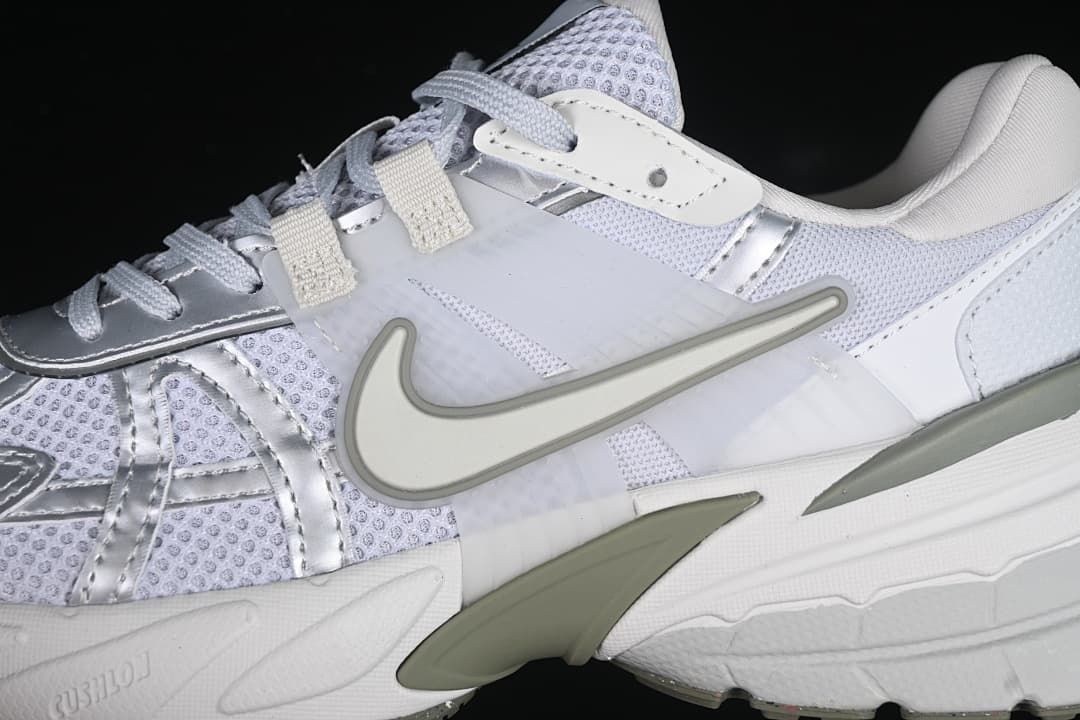 Close-up of the side Swoosh, mesh panels, and sculpted midsole