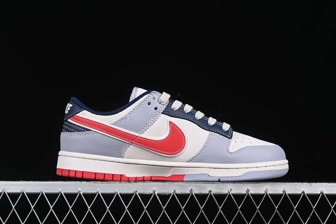 Side profile highlighting the red Swoosh and color-blocked panels