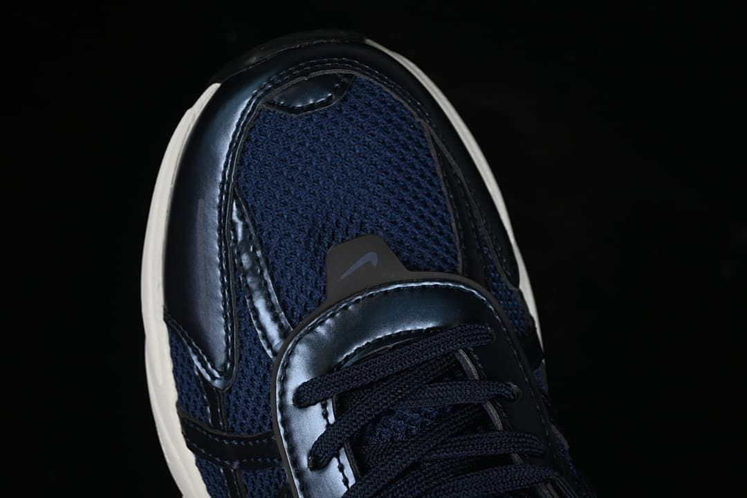 Close-up of the mesh-look navy toe and lace area