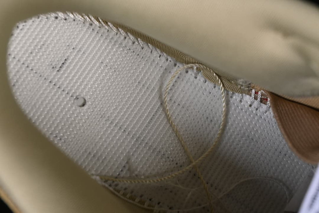 Close-up of the shoe's inner lining and stitching