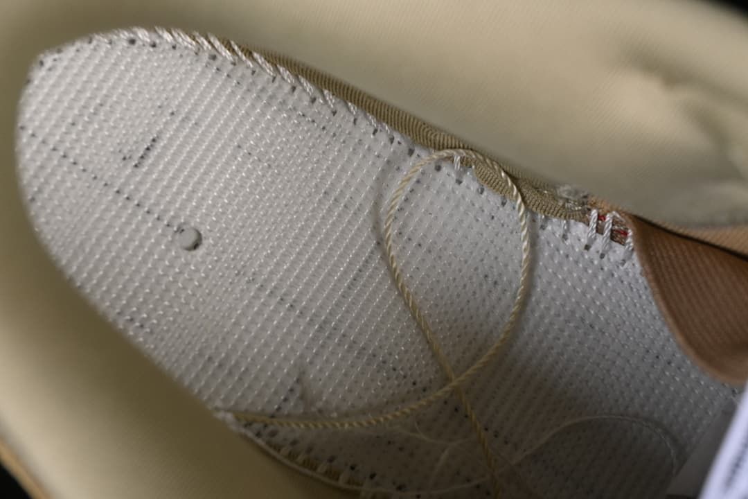 Close-up of the shoe's inner lining and stitching