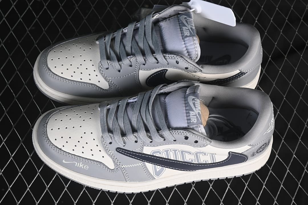 Pair of gray and off-white low-top sneakers shown from above.