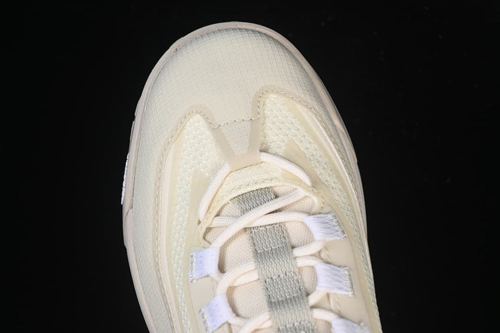 Top view of the shoe's rounded toe and lace-up front