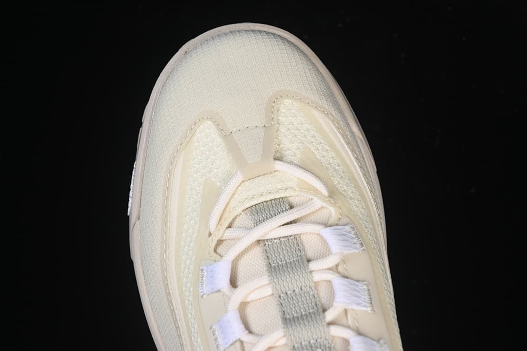 Top view of the shoe's rounded toe and lace-up front