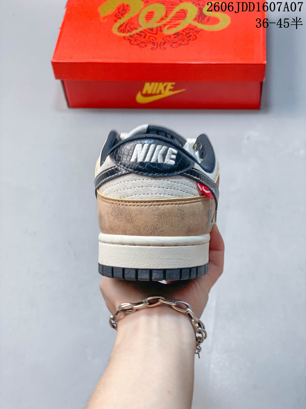 Rear view of a beige and cream Nike low-top sneaker with dark navy heel detailing; image overlay states sizes 36–45.5.