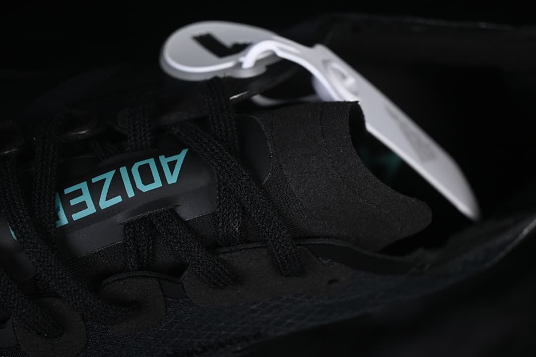 Close-up of the tongue and black lace-up closure