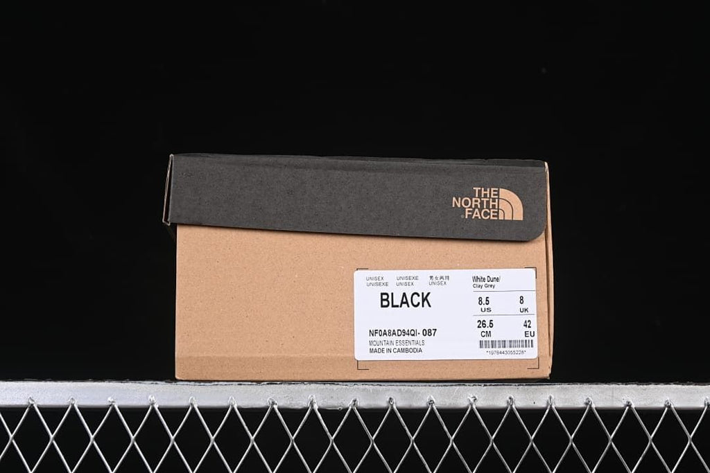 Product box label showing Black, Mountain Essentials, and style code NF0A8AD94QI-087