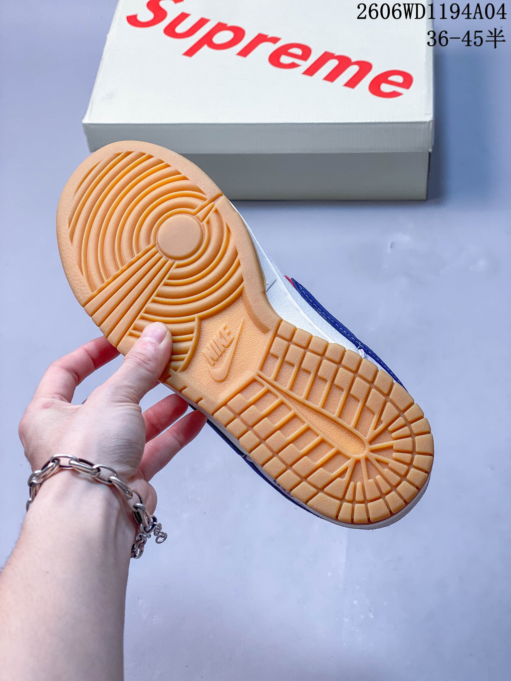 Gum-colored outsole with circular tread pattern