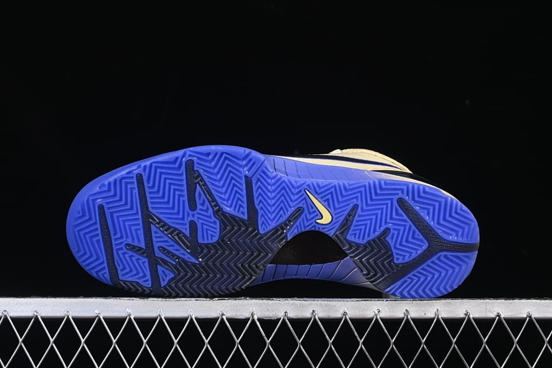 Underside view showing the blue and black outsole tread.
