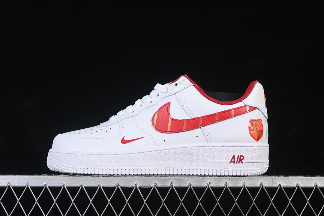 Opposite side view showing red and gold details, zodiac-inspired heel graphic, and red Air branding.