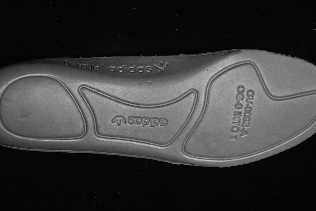 Close-up of the outsole with adidas branding