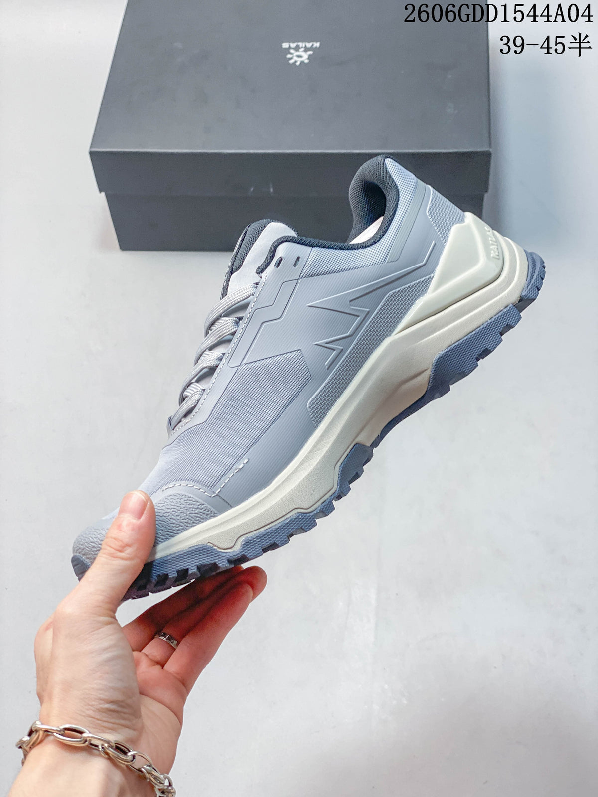 Side profile of a light grey KAILAS low-top hiking shoe.