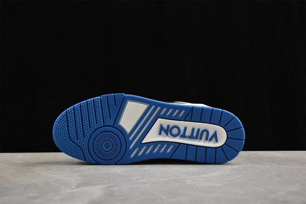 Underside view of the blue patterned sneaker outsole