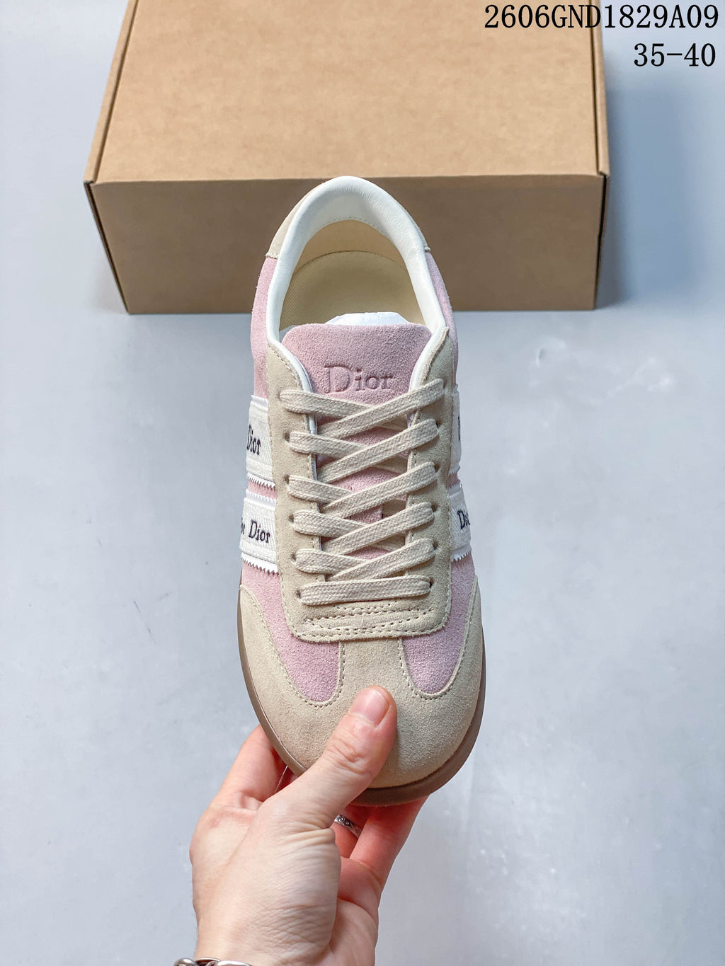 Front view of the lace-up sneaker with a rounded toe