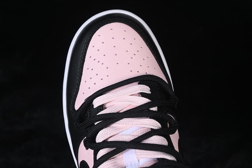 Top view of the perforated pale pink toe and laces